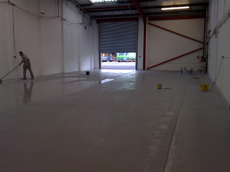 The floor was coated and sealed with a water-based epoxy this was followed by a finish coat of high build epoxy coating. As the photograph denotes there is a distinctive finish in the base coat and second coat
