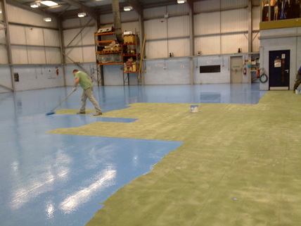 The floor was captive shot-blasted and sealed with a first coat of water based epoxy.
